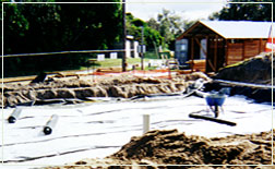 Trine Solution construction of a sand filter for a private residence waste water management system